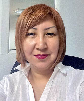 Intelligent lady Gul'mira from Aktobe (Kazakhstan), 48 yo, hair color red